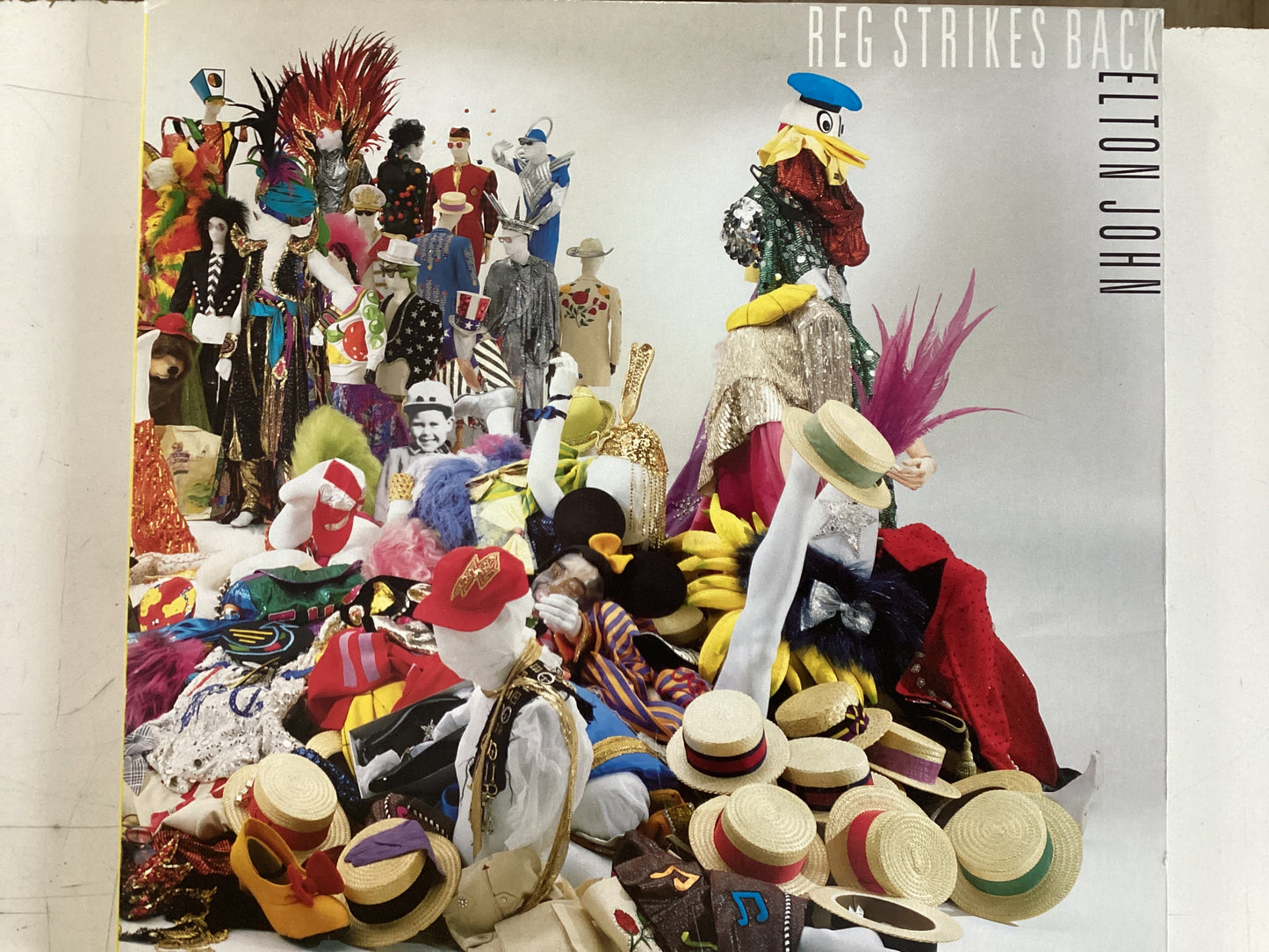 JOHN, ELTON = REG STRIKES BACK (CDA 1988) (USED)