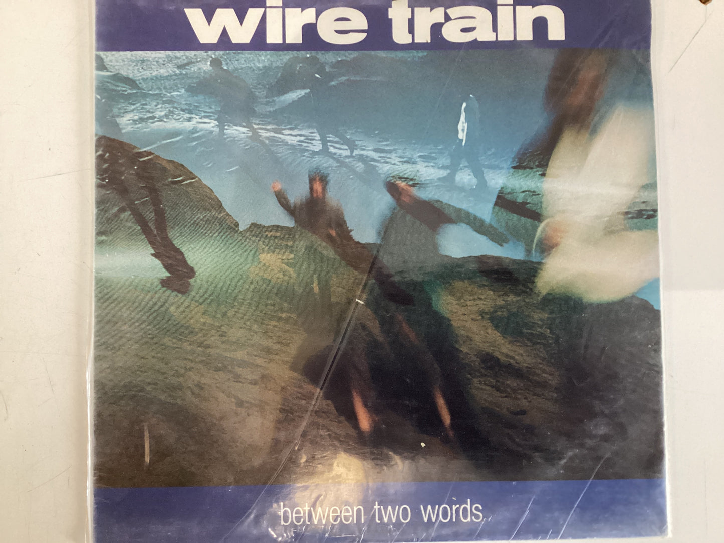 WIRE TRAIN = BETWEEN TWO WORDS (CDA 185) (USED)
