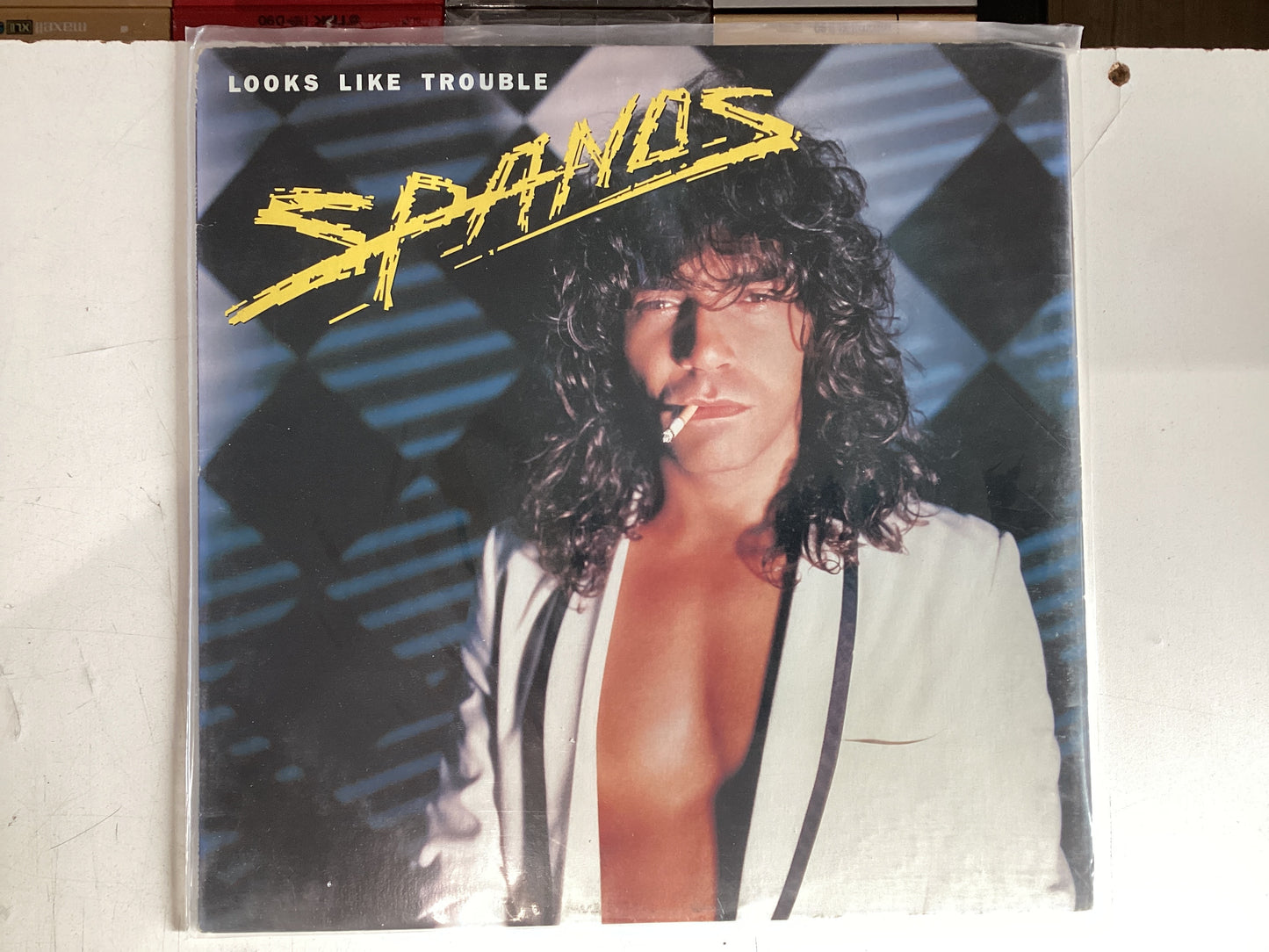 SPANOS = LOOKS LIKE TROUBLE (CDA 1984) (USED)
