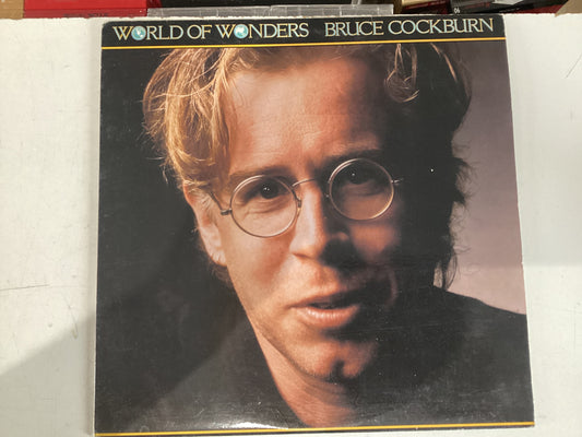COCKBURN, BRUCE = WORLD OF WONDERS (CDA 1985) (USED)