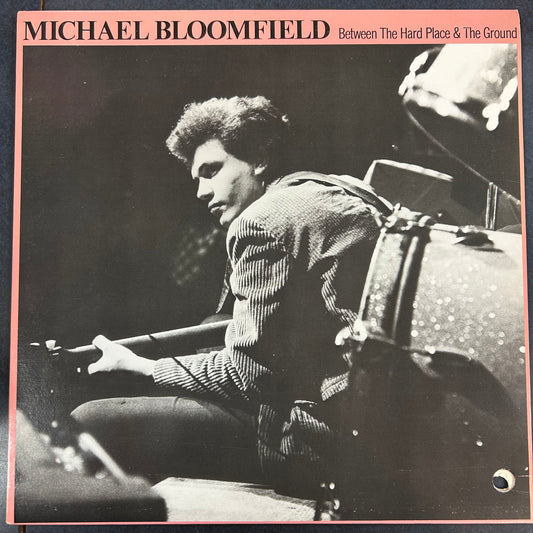 BLOOMFIELD, MICHAEL = BETWEEN THE HARD PLACE & THE GROUND (CDN 1979) (USED)