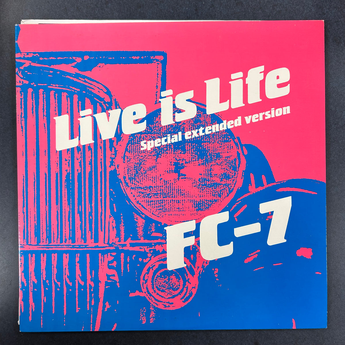 FC-7 = LIVE IS LIFE (12 IN.) (CDN 1985) (USED)
