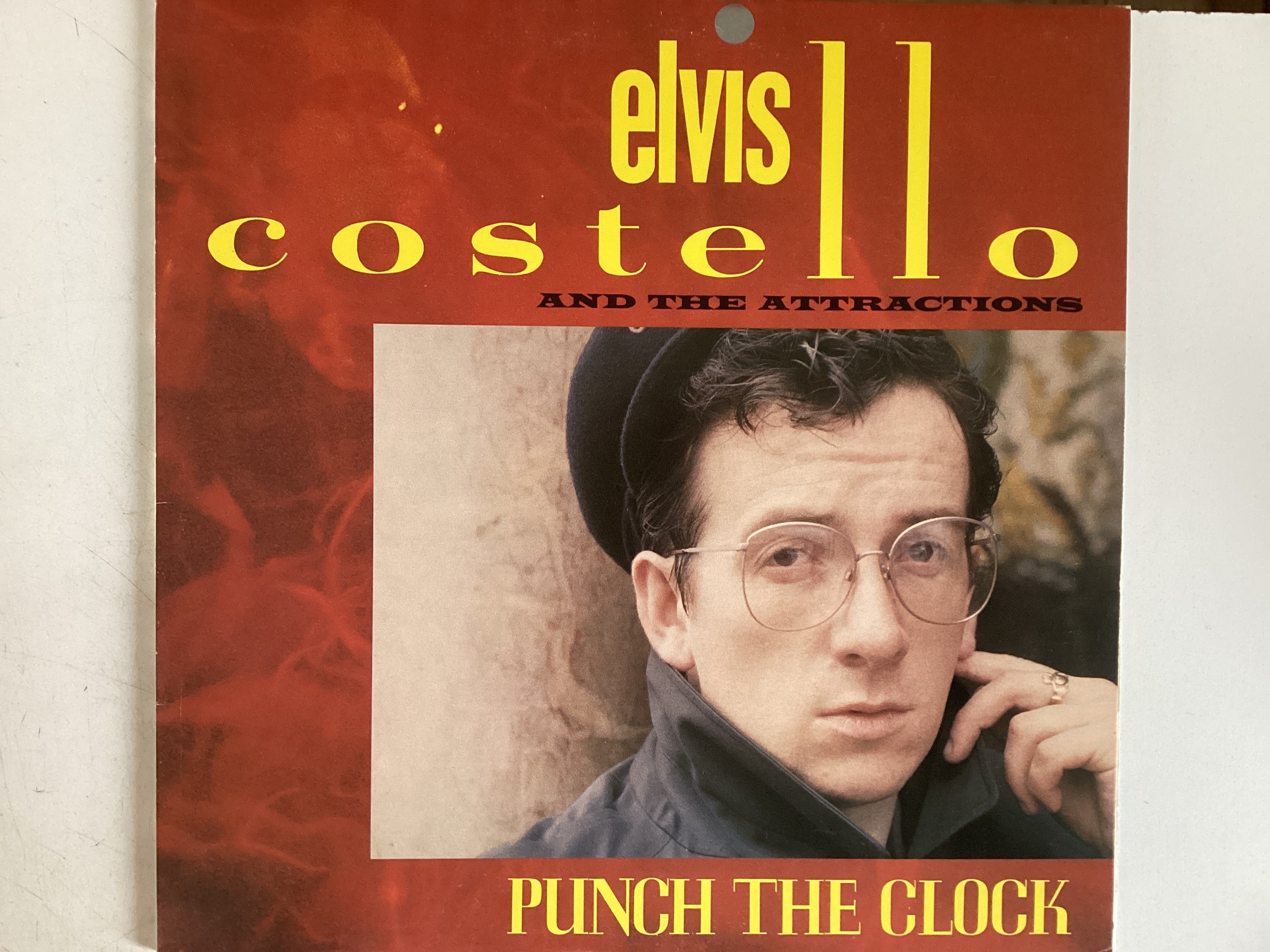 COSTELLO, ELVIS AND THE ATTRACTIONS = PUNCH THE CLOCK (CDA 1983) (USED)