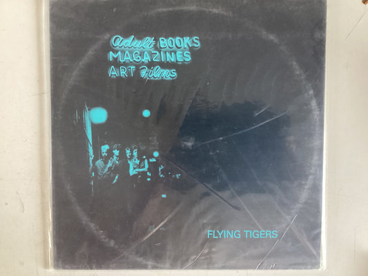 FLYING TIGERS = ADULT BOOKS MAGAZINES ANS ART FILMS (USA 1983) (USED)