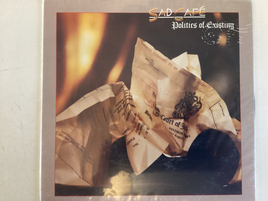 SAD CAFE = POLITICS OF EXISTING (CDA 1983) (USED)