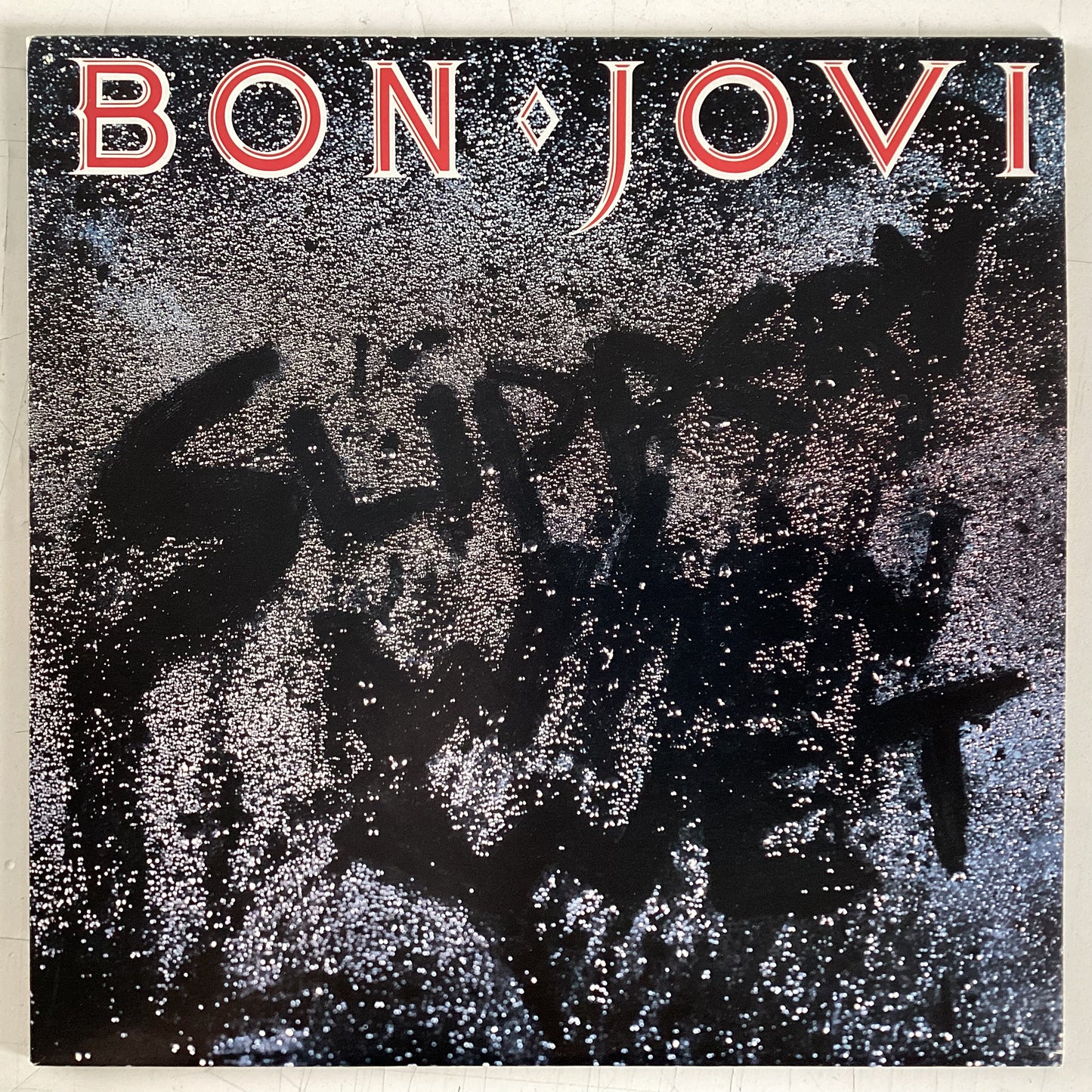 BON JOVI  = SLIPPERY WHEN WET (CDN 1986) (USED)