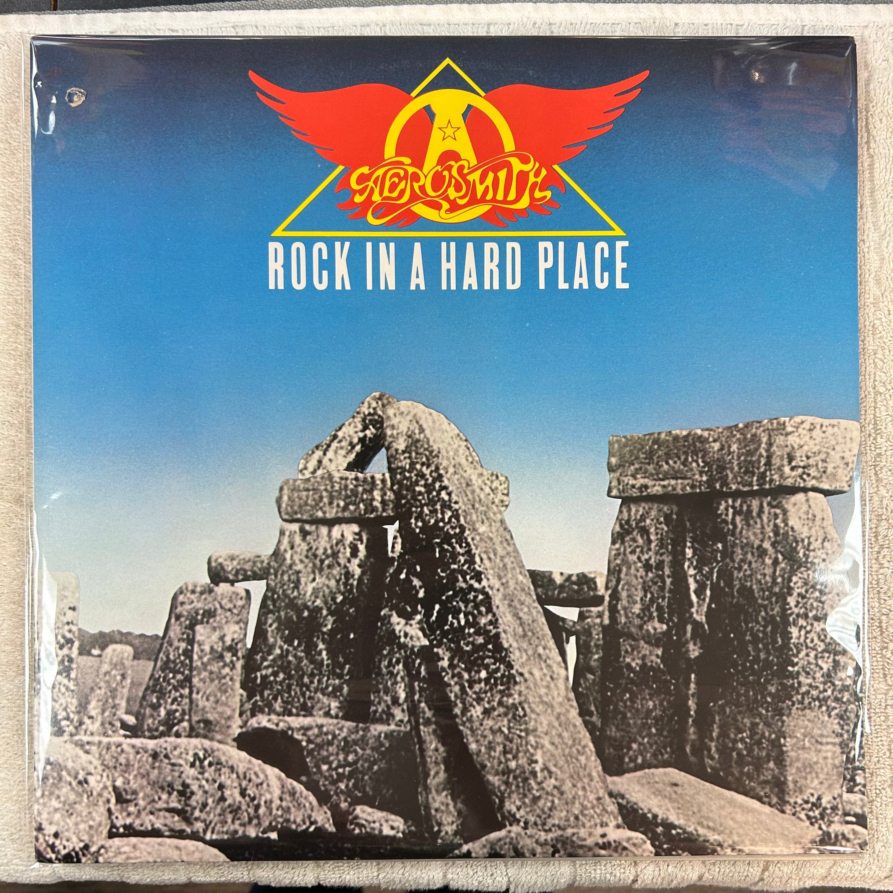 AEROSMITH = ROCK IN A HARD PLACE (CDN 1982) (USED)
