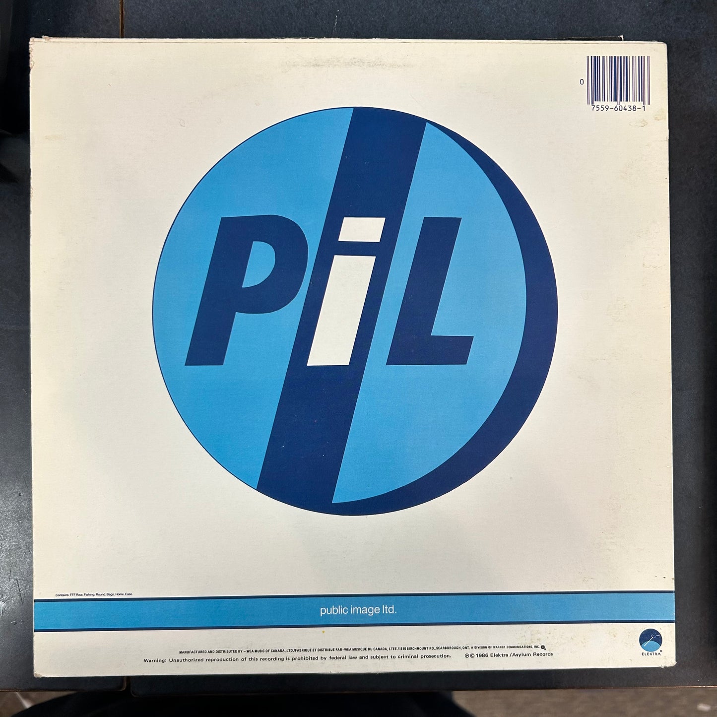 PUBLIC IMAGE LTD. = ALBUM (CDN 1986) (USED)
